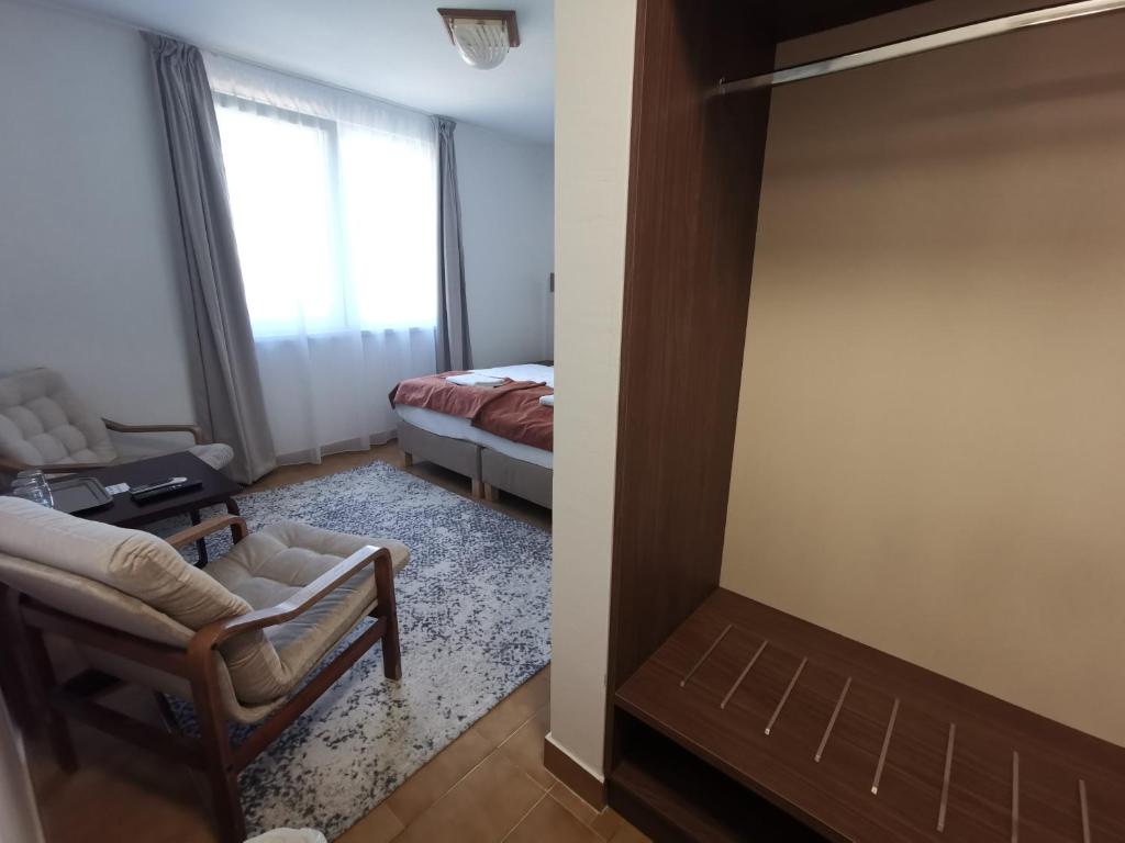 Postel nebo postele na pokoji v ubytování Laguna Panzió