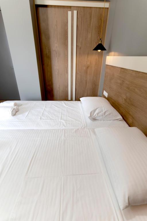 Postel nebo postele na pokoji v ubytování boulevard apartments