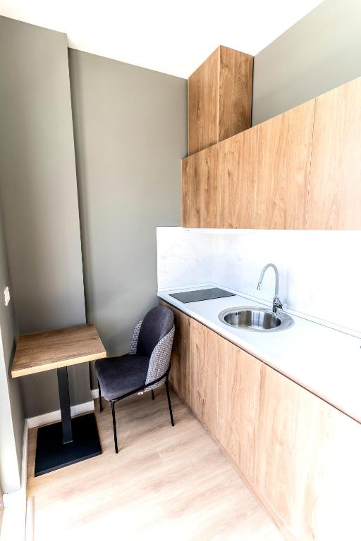 Kuchyň nebo kuchyňský kout v ubytování boulevard apartments