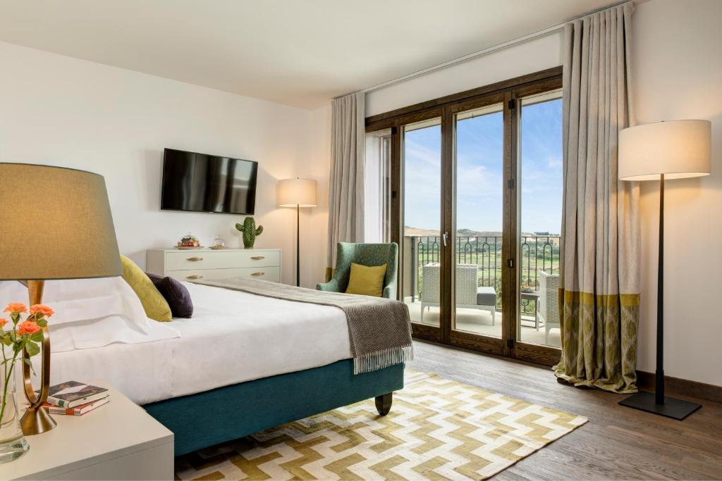 Posteľ alebo postele v izbe v ubytovaní Rocco Forte Private Villas