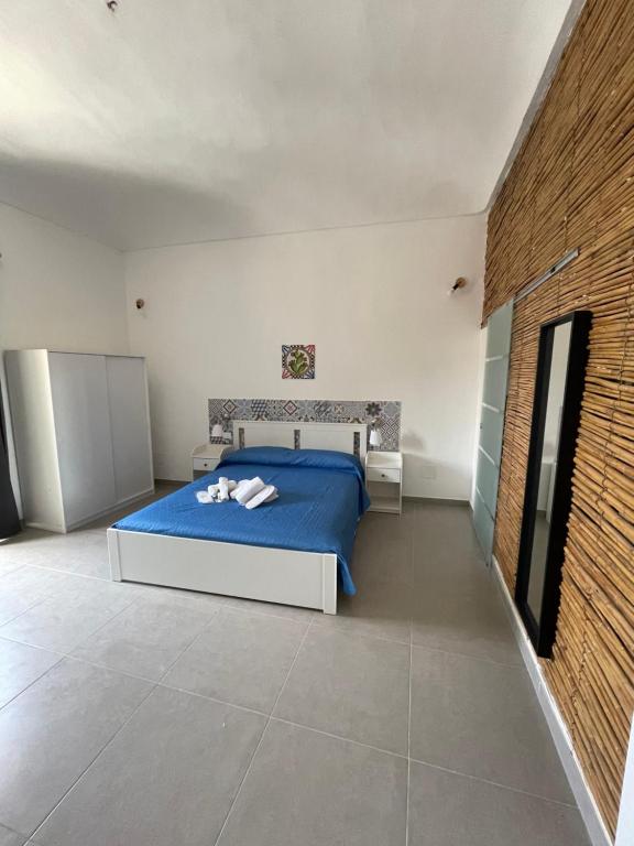 Postel nebo postele na pokoji v ubytování Hercules Suites