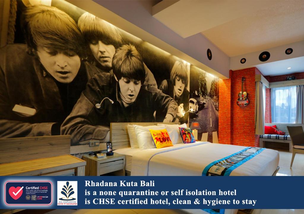 a bedroom with a mural of the band koko bash at Rhadana Hotel in Kuta