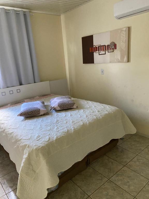 Postel nebo postele na pokoji v ubytování Pousada Pickler