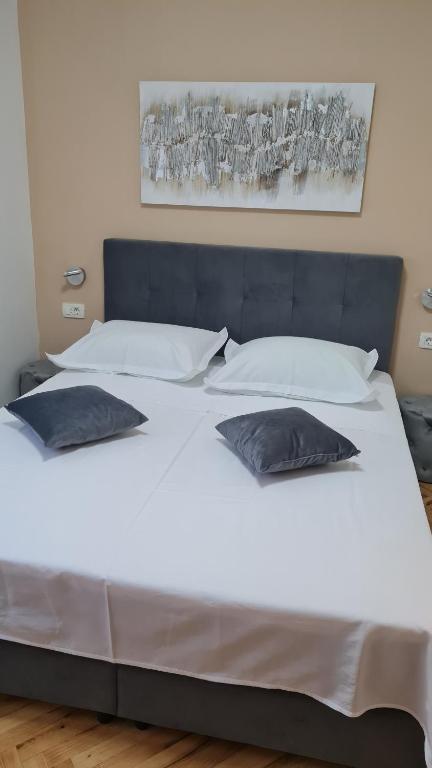 Posteľ alebo postele v izbe v ubytovaní Apartments Prižmić