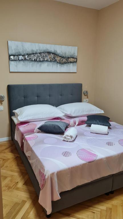 Posteľ alebo postele v izbe v ubytovaní Apartments Prižmić
