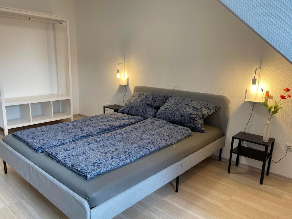 Postel nebo postele na pokoji v ubytování promedklinik apartment 2