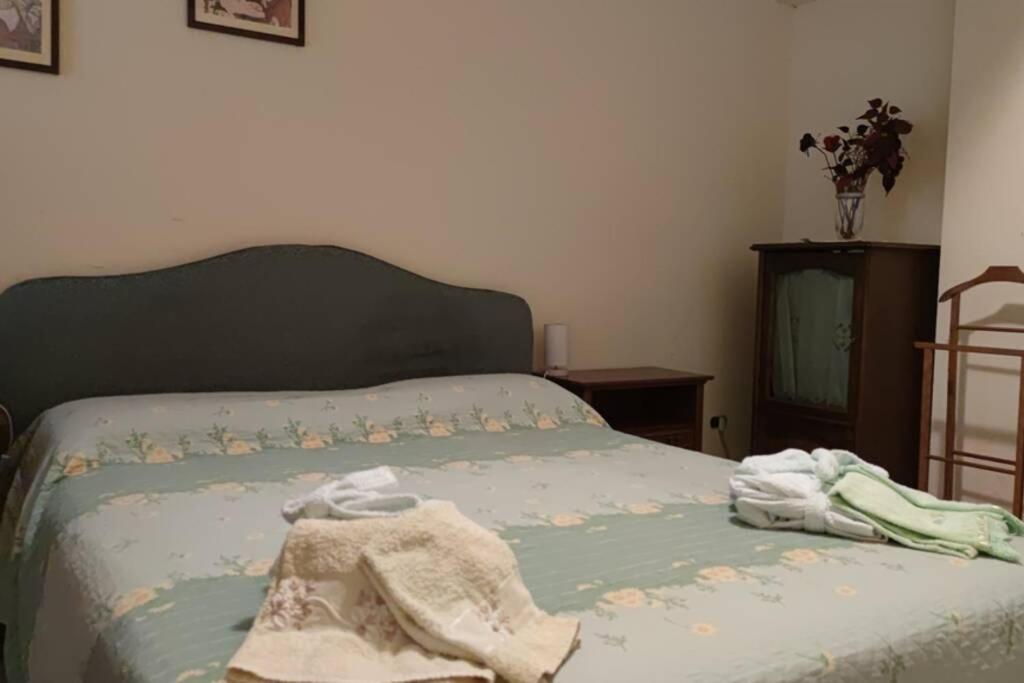 Łóżko lub łóżka w pokoju w obiekcie Appartamento incantevole 90 mq a due passi mare mozzafiato