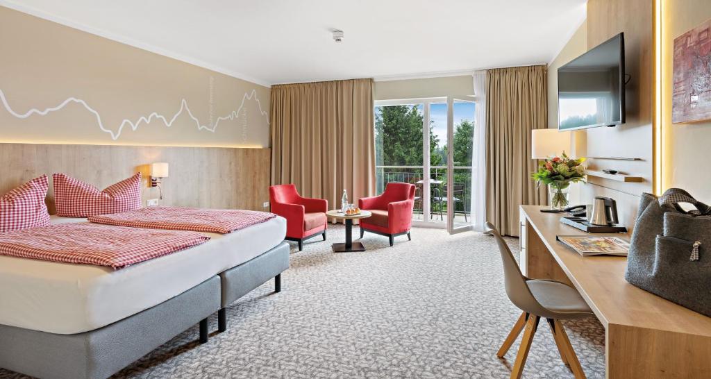 TV a/nebo společenská místnost v ubytování Hotel & Pension Traumblick
