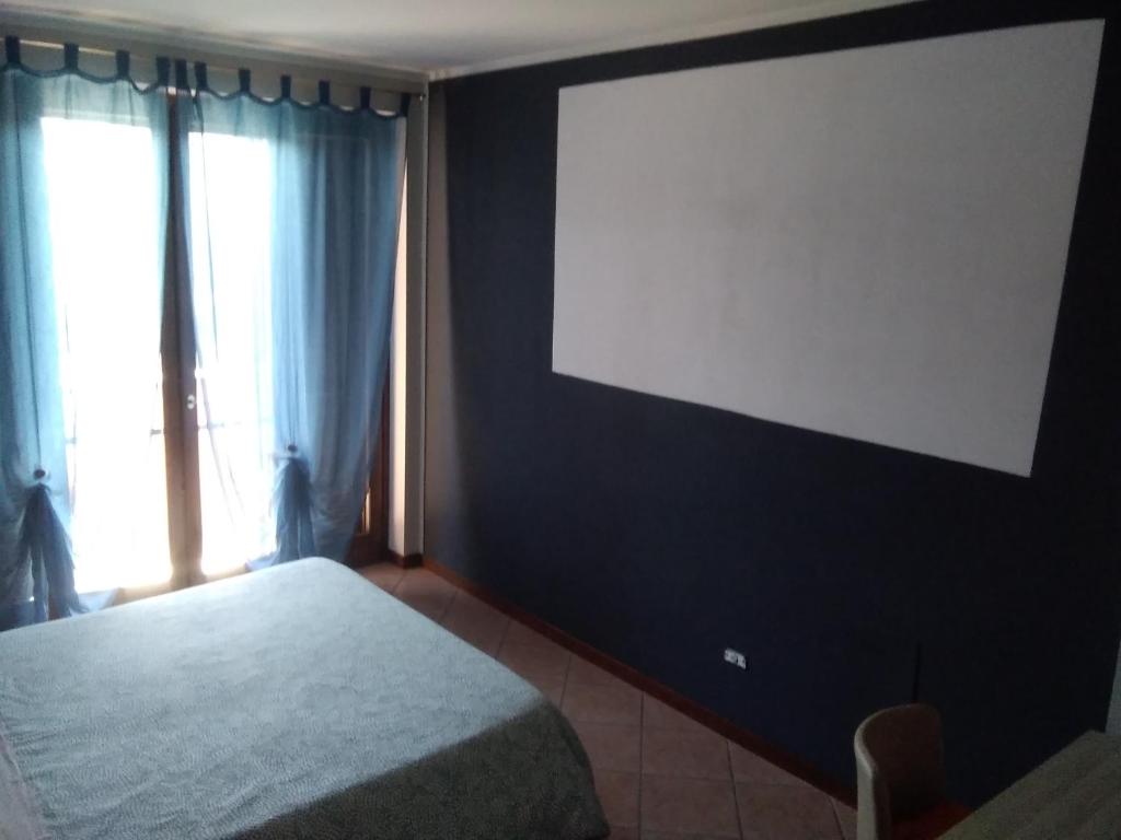 Postel nebo postele na pokoji v ubytování Welcome B&B Lodi