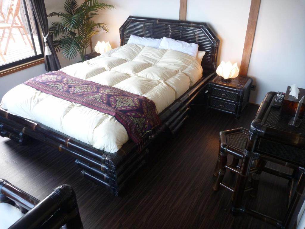 Postel nebo postele na pokoji v ubytování Izu Shirahama South Beach - Vacation Stay