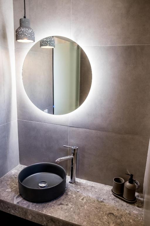 A bathroom at Evangeline Maisons