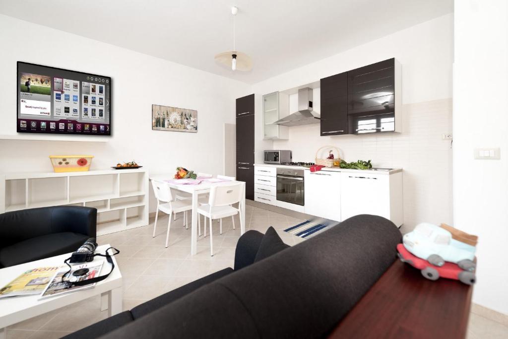 Kuchyň nebo kuchyňský kout v ubytování Livingapple Beach