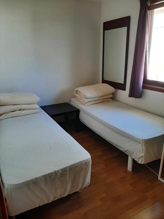 Postel nebo postele na pokoji v ubytování Gardenview Room
