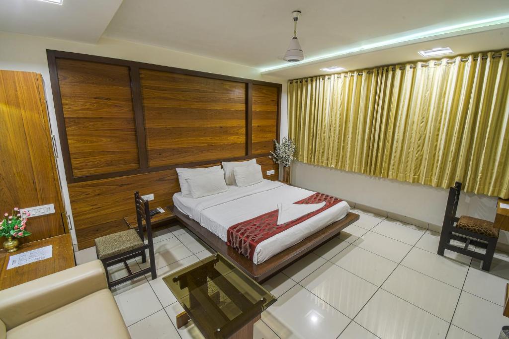 Postel nebo postele na pokoji v ubytování Hotel Radiant