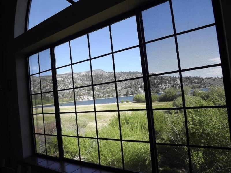 a window with a view of a field of grass at Rr-edgewater01 in June Lake