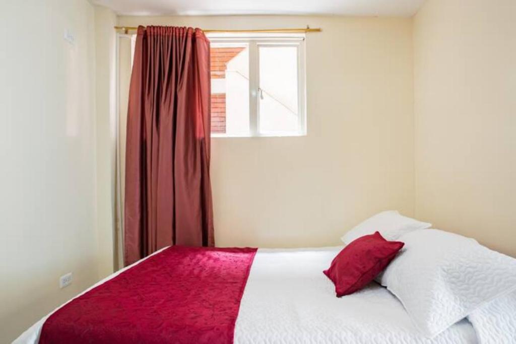 Postel nebo postele na pokoji v ubytování Touristic House