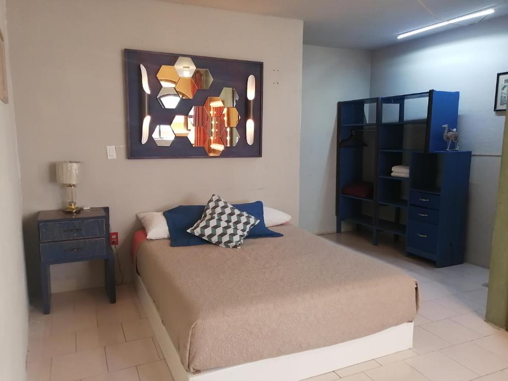 Кровать или кровати в номере Hotel Tres Piedras