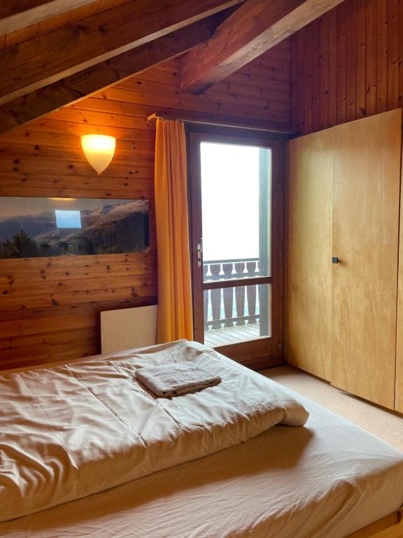 Postel nebo postele na pokoji v ubytování Chalet Sonnenröschen