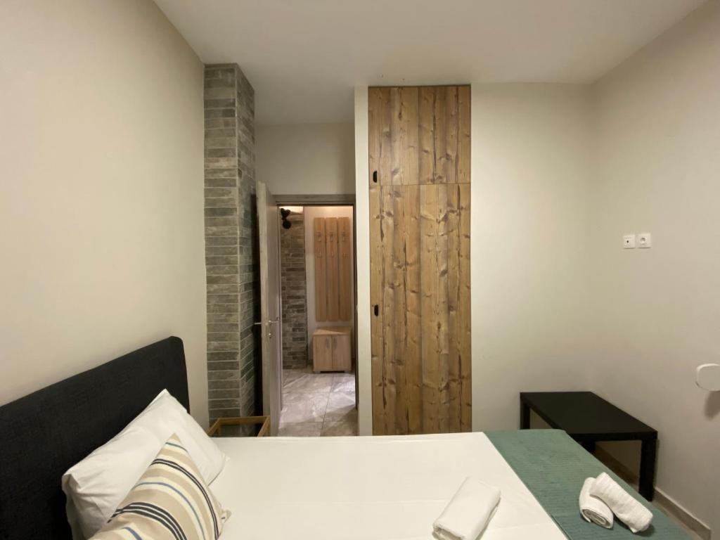 Postel nebo postele na pokoji v ubytování Davidana Deluxe Apartments