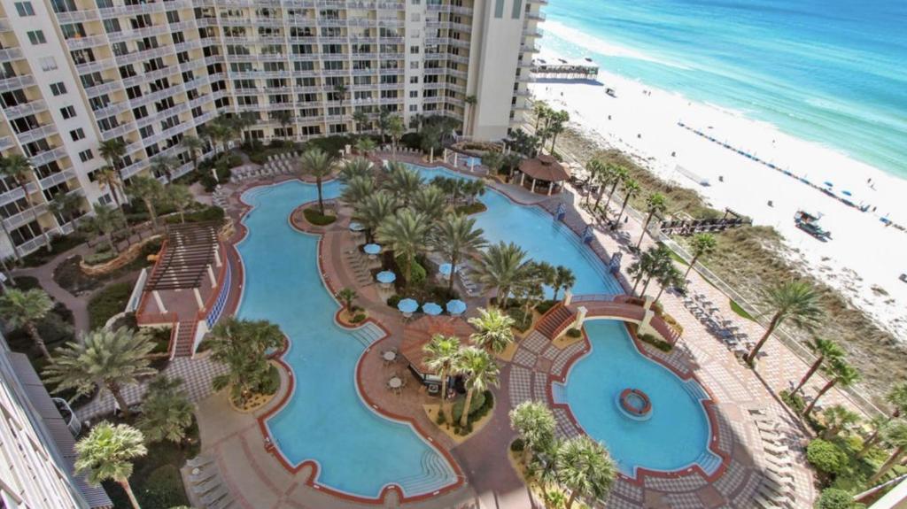 an aerial view of a resort with a swimming pool and the beach at Shores of Panama Unit 1209 in Panama City Beach