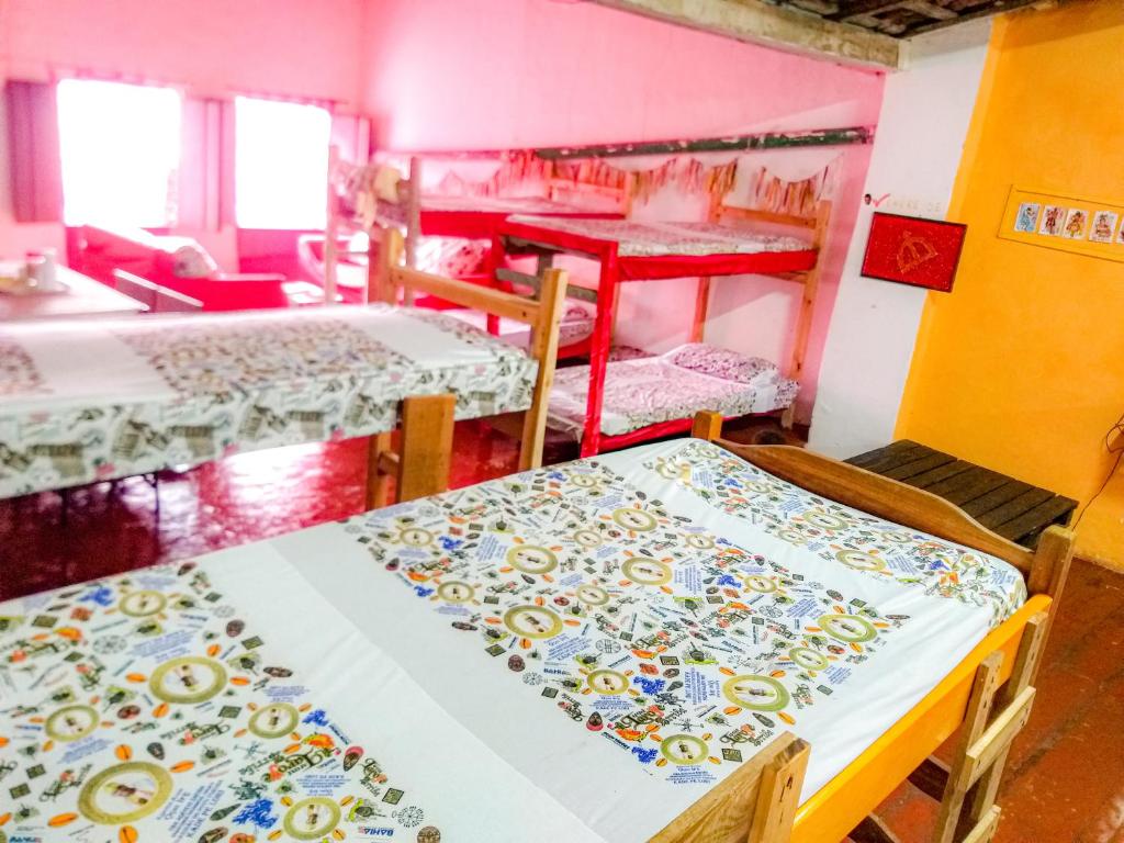 Postel nebo postele na pokoji v ubytování Hostel Ateliê Laroyê
