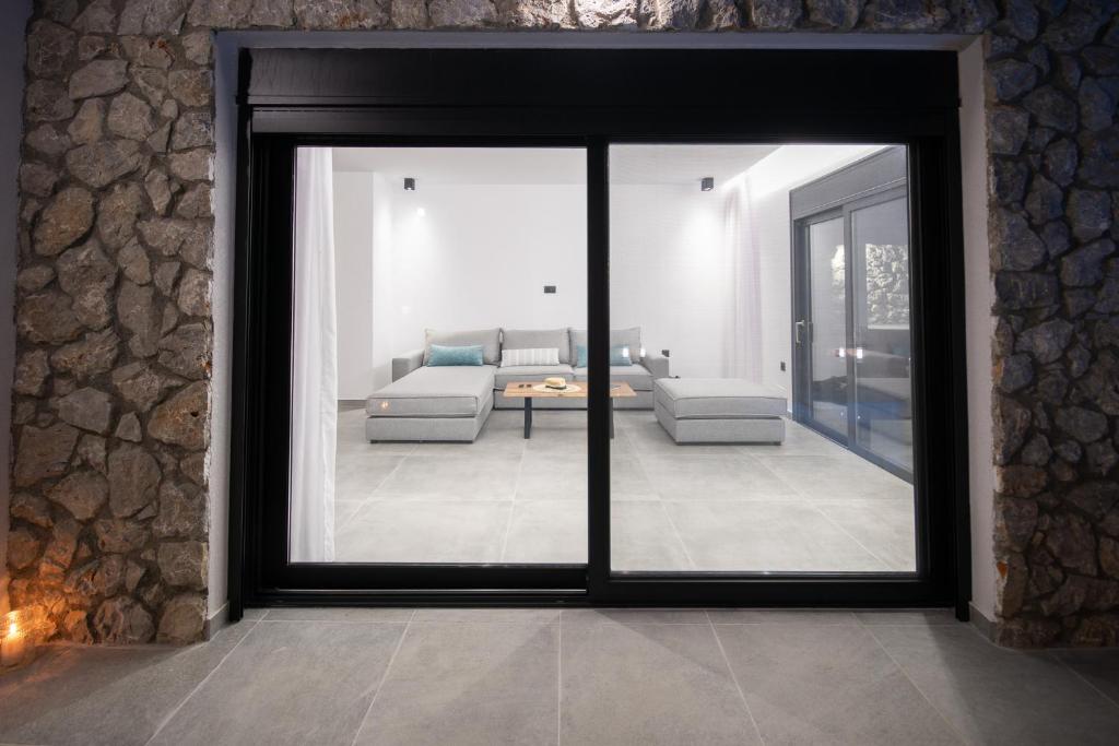 Postel nebo postele na pokoji v ubytování Terra Secreta Luxury Villas