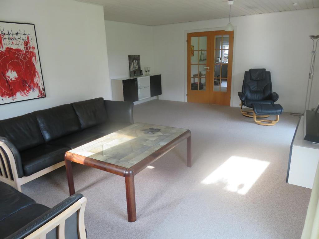Posezení v ubytování Gudená Riverview Villa