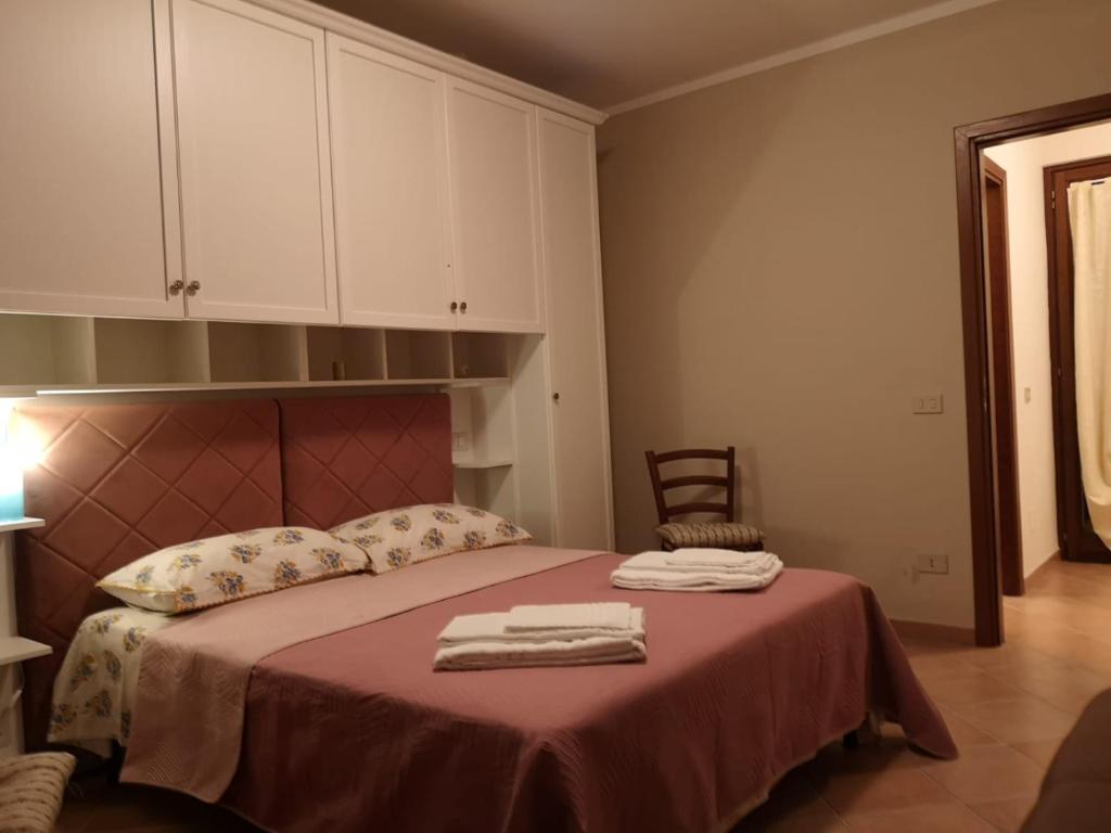 Łóżko lub łóżka w pokoju w obiekcie Villa Terrena