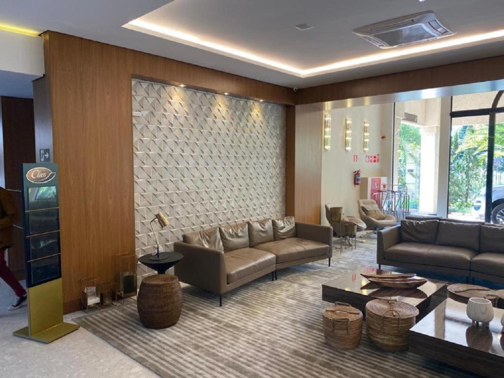 Uma área de estar em Class Hotel Piracicaba