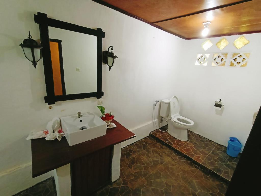 Koupelna v ubytování Tangkoko Sanctuary Villa