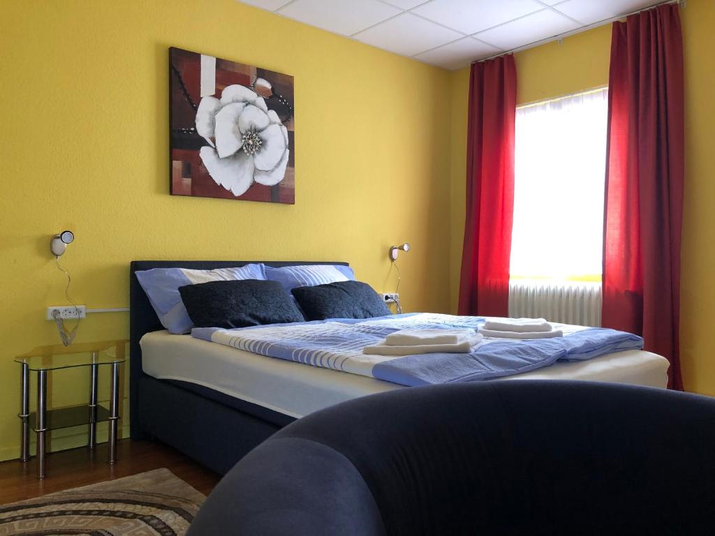Postel nebo postele na pokoji v ubytování Astoria Hotel Heimbach