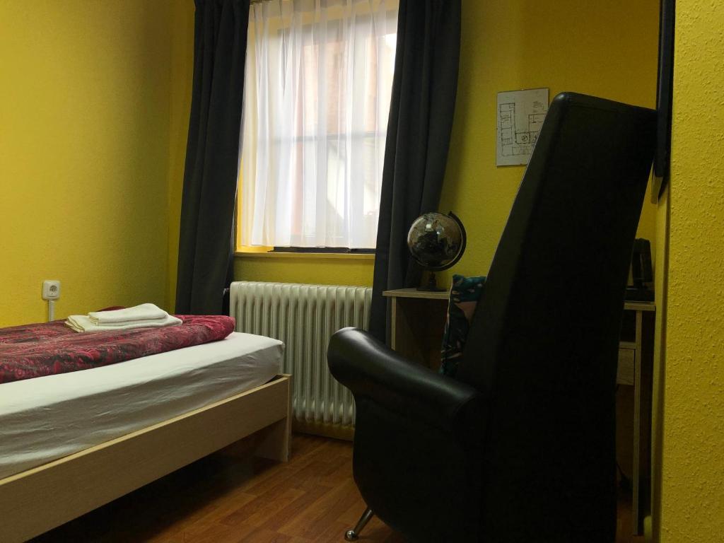 Postel nebo postele na pokoji v ubytování Astoria Hotel Heimbach