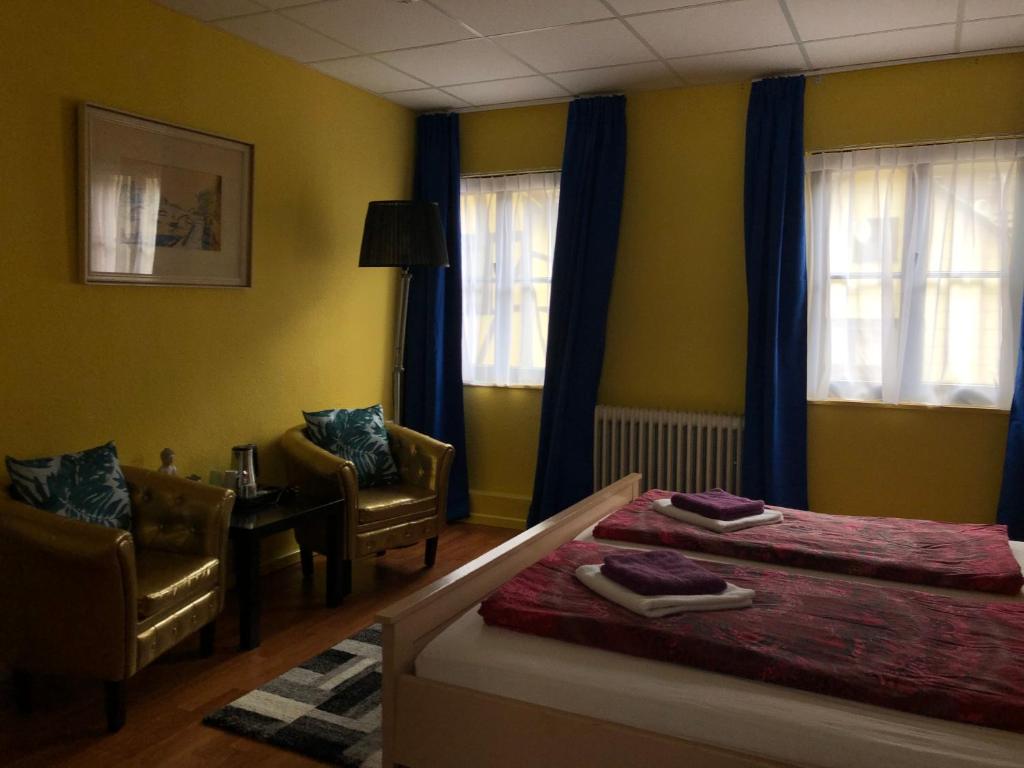 Postel nebo postele na pokoji v ubytování Astoria Hotel Heimbach