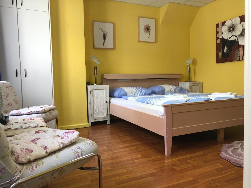 Postel nebo postele na pokoji v ubytování Astoria Hotel Heimbach