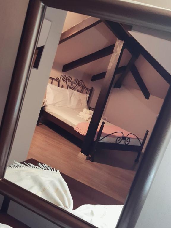 Postel nebo postele na pokoji v ubytování Konitsa Panorama