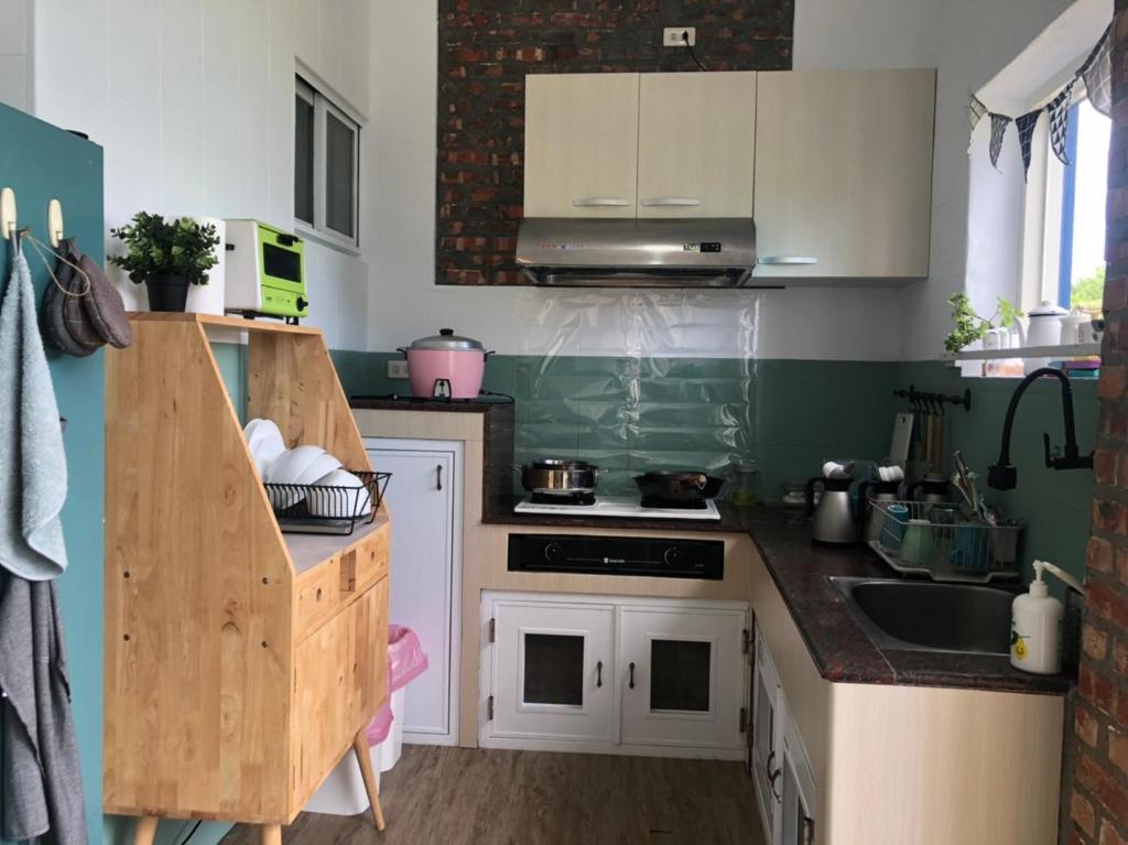 Kuchyň nebo kuchyňský kout v ubytování Sea House