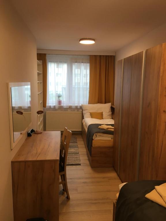 Postel nebo postele na pokoji v ubytování Byt Pod Lesom