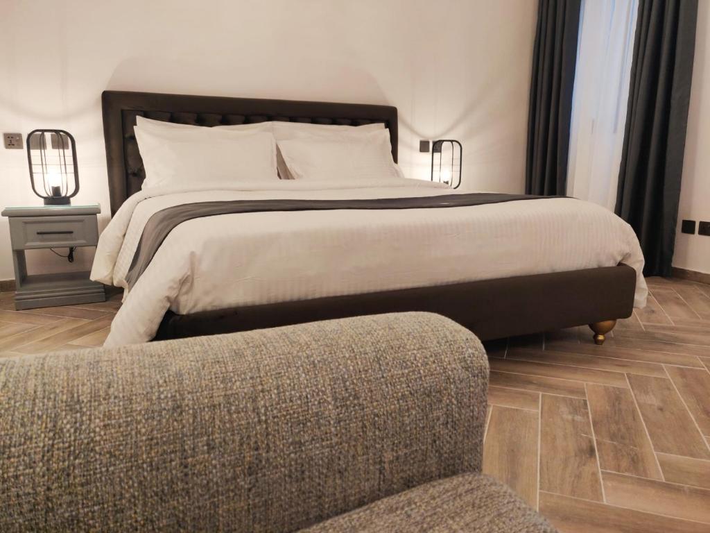 Postel nebo postele na pokoji v ubytování Casa Reale Boutique Hotel