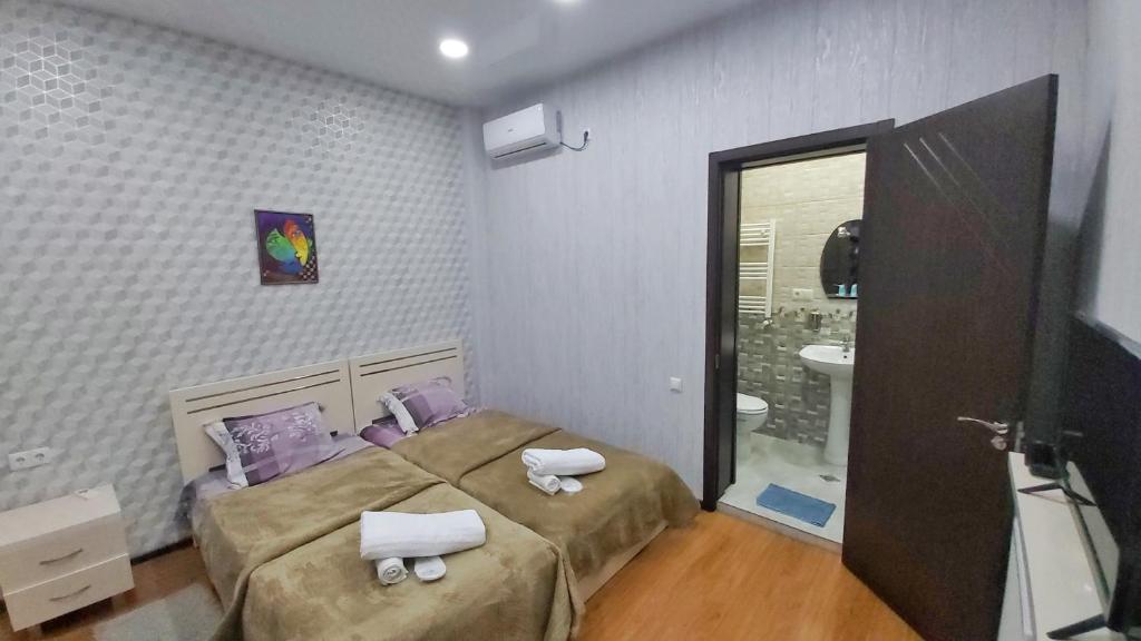 TV a/nebo společenská místnost v ubytování Gamarjoba Hotel