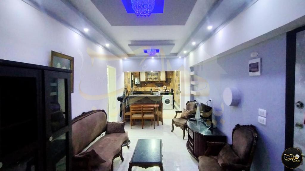 a living room with couches and a dining room at شقة للإيجار اليومي أمام عمارات المحروسة لا ترى البحر 7 in Alexandria