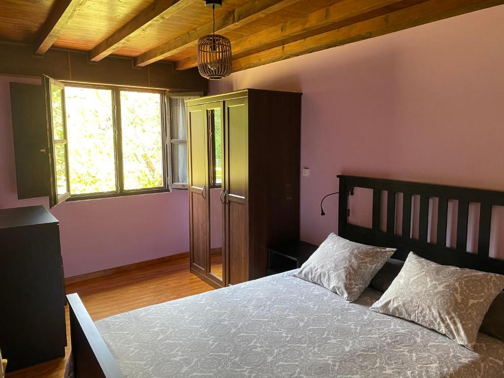 Postel nebo postele na pokoji v ubytování Vivienda vacacional Peña Tú