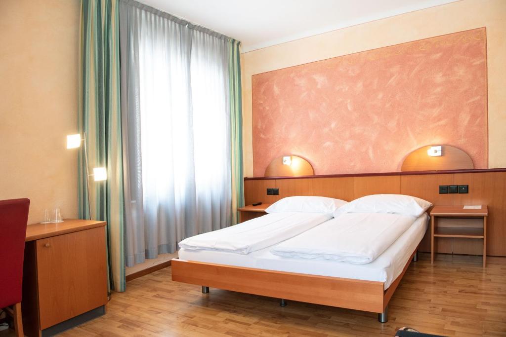 Postel nebo postele na pokoji v ubytování Al Giardinetto