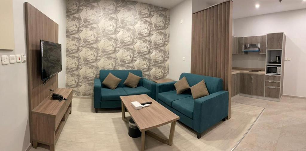 Kuchyň nebo kuchyňský kout v ubytování Al-Haramain Family Apartments