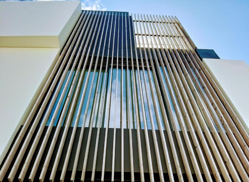 a facade of a building with a view of the sky at Aljube Residences III - Apart novo no centro de PDL in Ponta Delgada