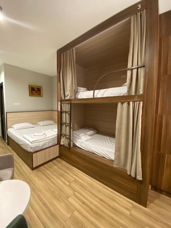Postel nebo postele na pokoji v ubytování Loft Host Yerevan