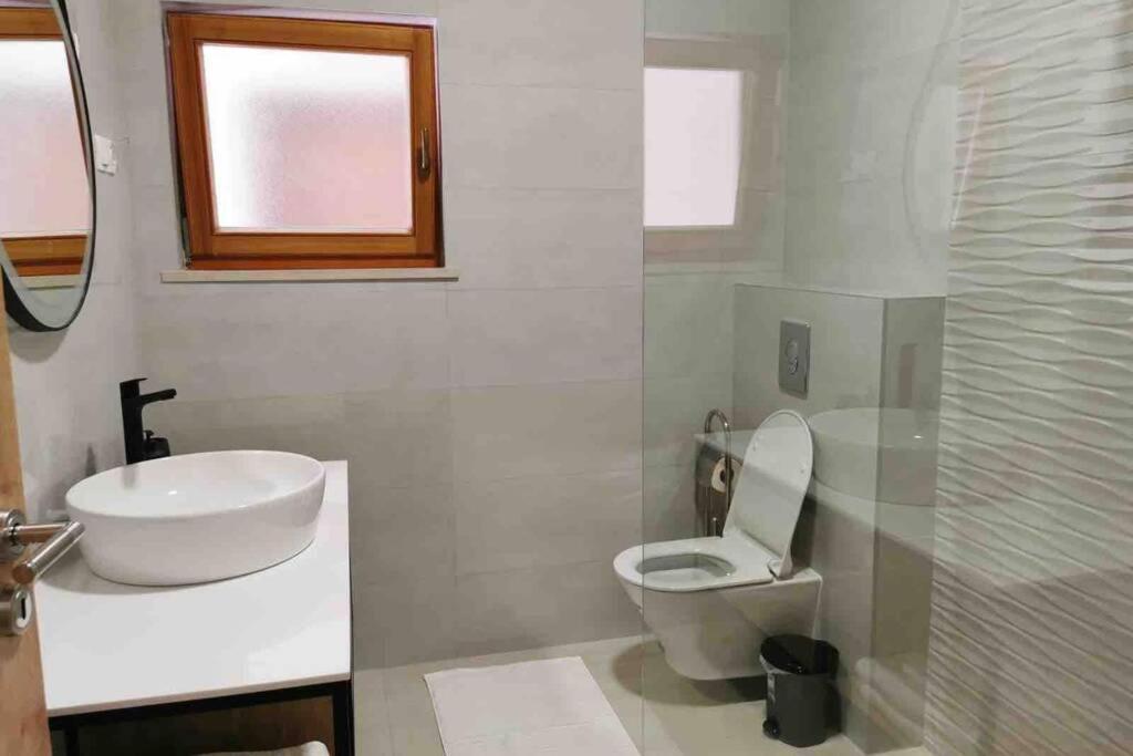 Kúpeľňa v ubytovaní Deluxe apartman “ Koromačna”