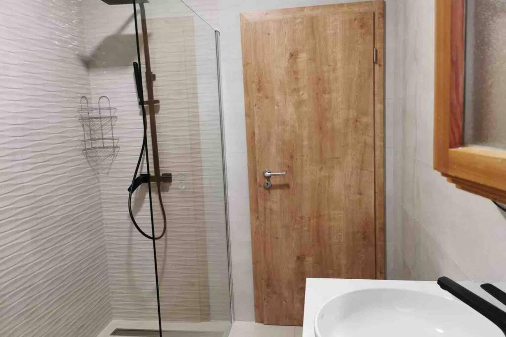 Kúpeľňa v ubytovaní Deluxe apartman “ Koromačna”