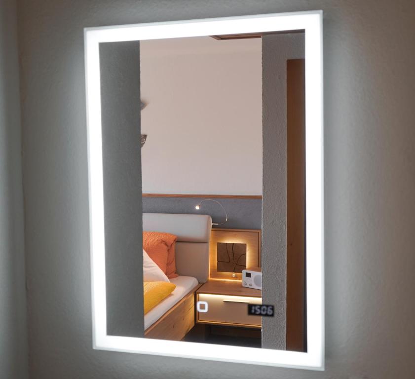 Postel nebo postele na pokoji v ubytování Hotel Alpina