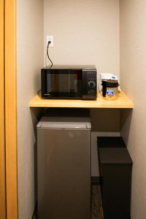 Kuchyň nebo kuchyňský kout v ubytování Hotel Celeste Shizuoka