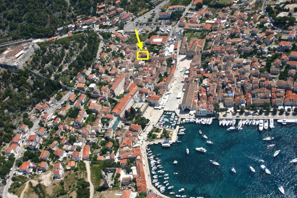 an aerial view of a town with boats in the water at LUXOR Hvar - Main Square Apartments in Hvar